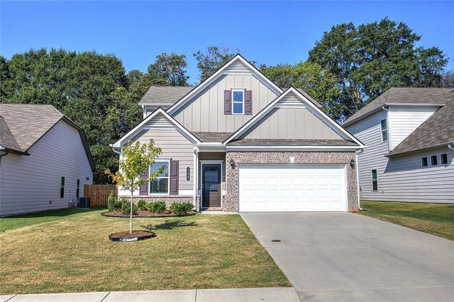 Front exterior of a new home in , Cartersville, GA, highlighting curb appeal (Image 23).
