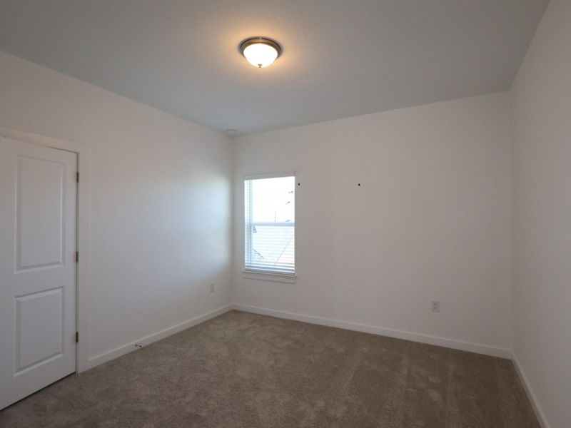 Spacious, unfurnished interior of a new home in Cedar Brook, Leander (Image 9).