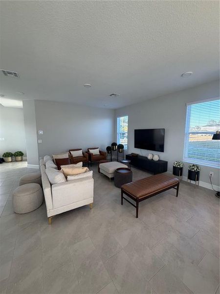 Furnished interior view inside a new home in Center Lake on the Park, St. Cloud (Image 5).
