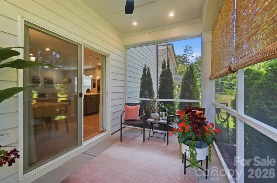 The perfect screened back porch to end your day!