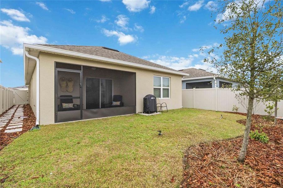 Exterior details and patio area of a home in Harmony West, St. Cloud (Image 27).