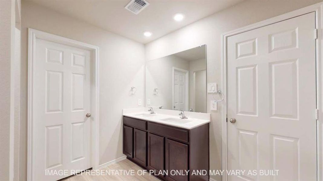 Full bathroom with double vanity