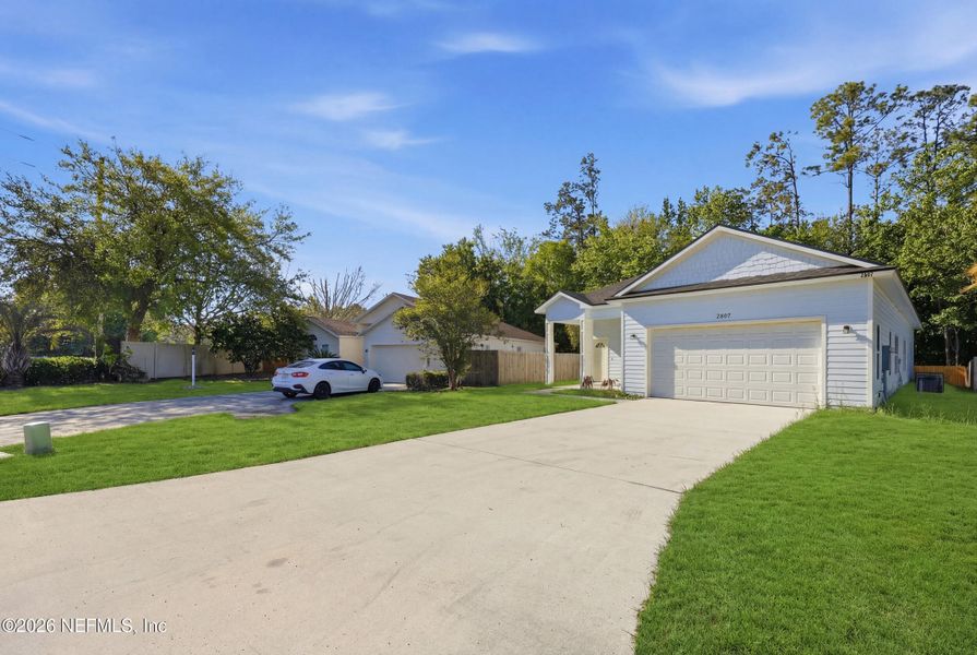 Front exterior of a new home in , Middleburg, FL, highlighting curb appeal (Image 21). Front exterior of a new home in , Middleburg, FL, highlighting curb appeal (Image 21).