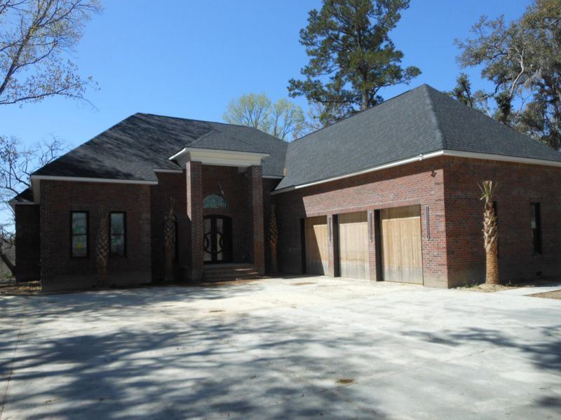Front exterior of a new home in , Summerville, SC, highlighting curb appeal (Image 26). Front exterior of a new home in , Summerville, SC, highlighting curb appeal (Image 26).