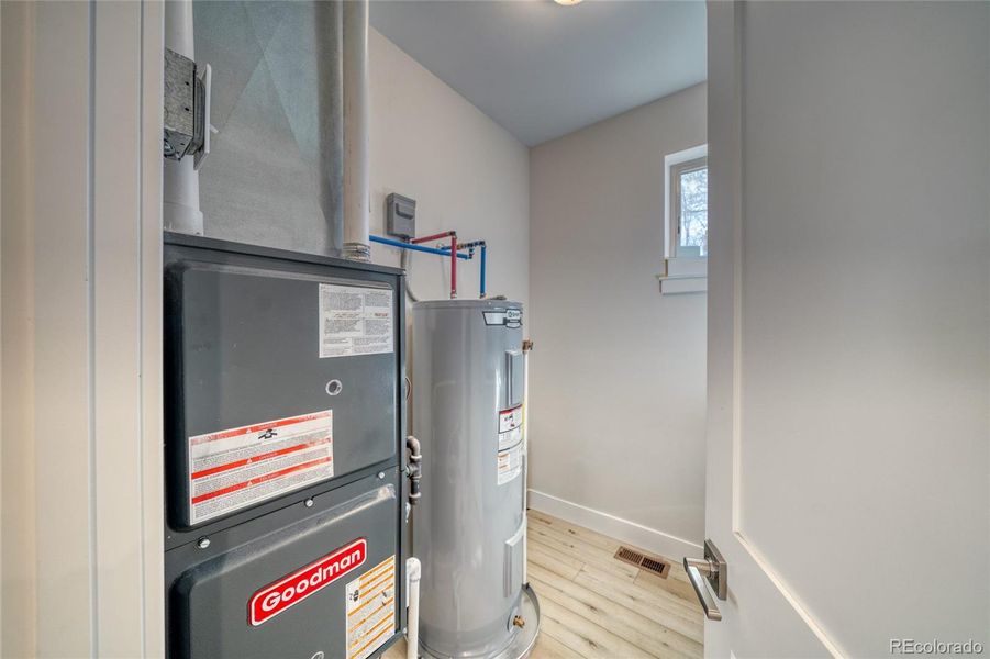 Laundry/utility room off the primary bedroom