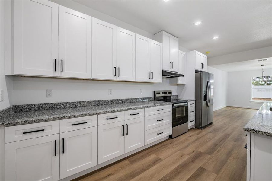 Furnished interior view inside a new home in , Dade City (Image 9).