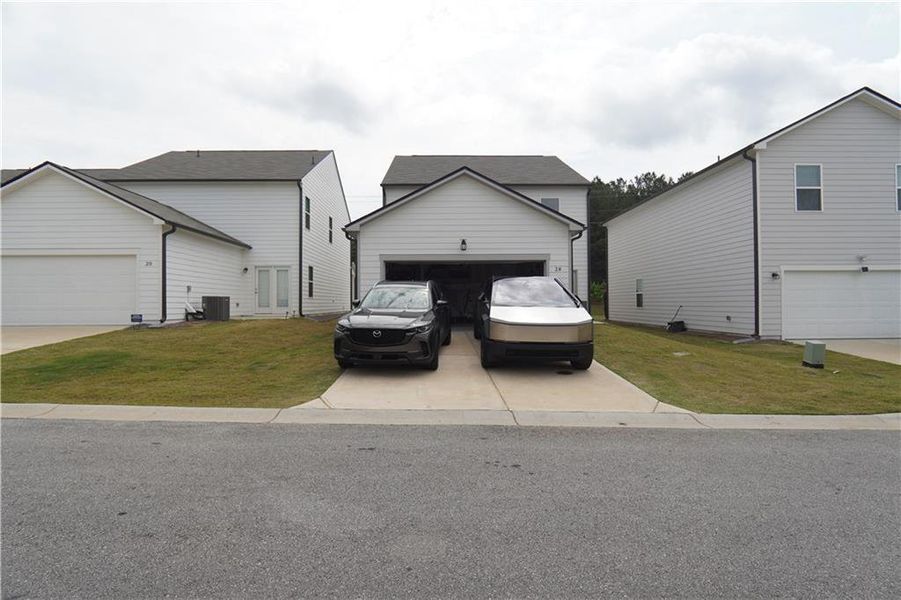 Front exterior of a new home in Casteel, Bethlehem, GA, highlighting curb appeal (Image 1). Front exterior of a new home in Casteel, Bethlehem, GA, highlighting curb appeal (Image 1).