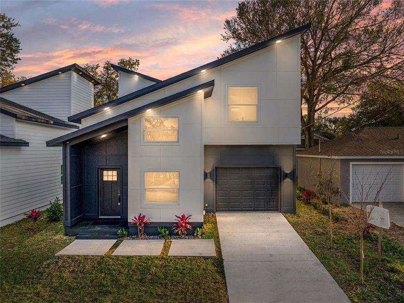 Front exterior of a new home in , Lakeland, FL, highlighting curb appeal (Image 29).