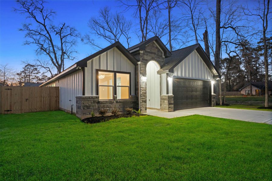 Front exterior of a new home in , Cleveland, TX, highlighting curb appeal (Image 19).