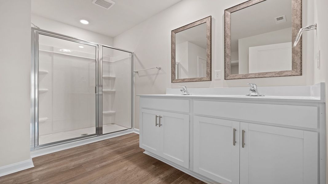 Furnished interior view inside a new home in Bentley Park, Greenwood (Image 8).