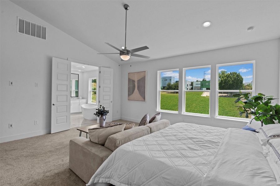 The vaulted ceiling makes this space feel even more spacious! With room for a couch, you know it's oversized.