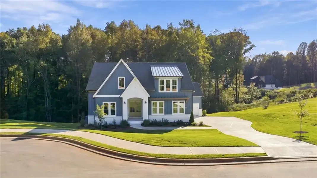 Front exterior of a new home in , Gainesville, GA, highlighting curb appeal (Image 25). Front exterior of a new home in , Gainesville, GA, highlighting curb appeal (Image 25).
