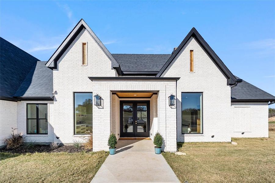 Front exterior of a new home in , Boyd, TX, highlighting curb appeal (Image 24). Front exterior of a new home in , Boyd, TX, highlighting curb appeal (Image 24).
