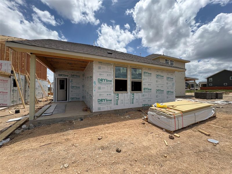 Front exterior of a new home in The Homestead at Lariat, Liberty Hill, TX, highlighting curb appeal (Image 2). Front exterior of a new home in The Homestead at Lariat, Liberty Hill, TX, highlighting curb appeal (Image 2).
