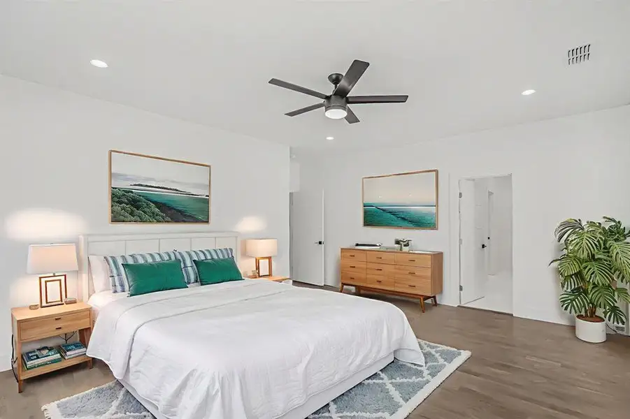 Bedroom with wood finished floors, recessed lighting, and ceiling fan