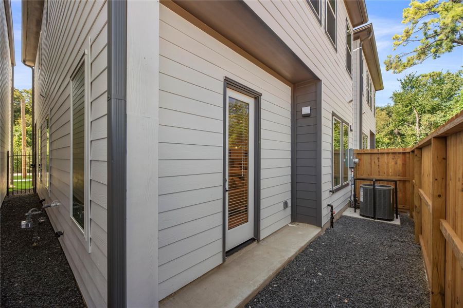 Exterior details and patio area of a home in , Houston (Image 1). Exterior details and patio area of a home in , Houston (Image 1).