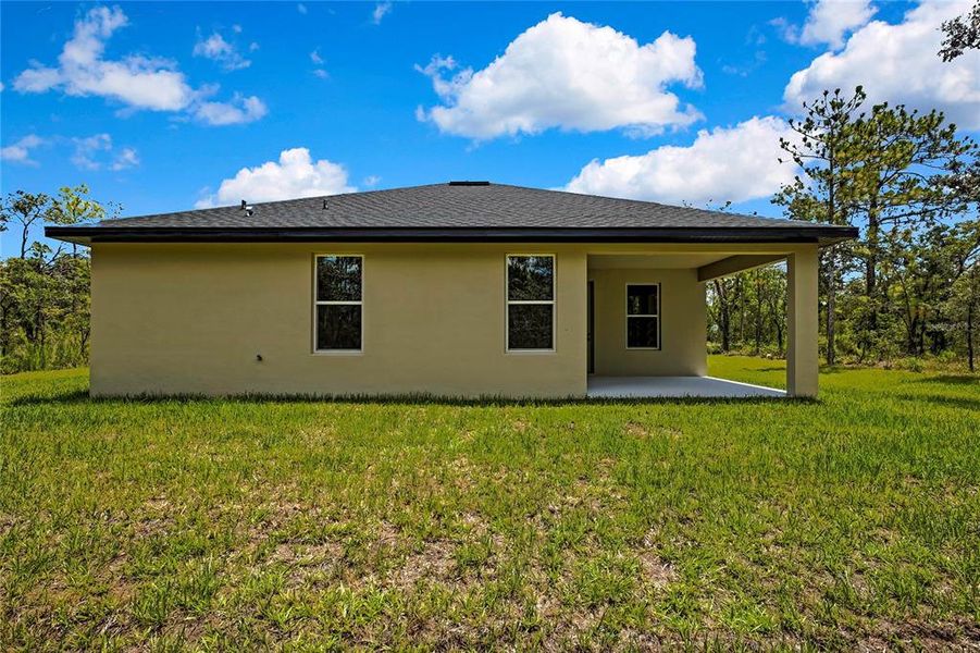 Front exterior of a new home in , Brooksville, FL, highlighting curb appeal (Image 2).