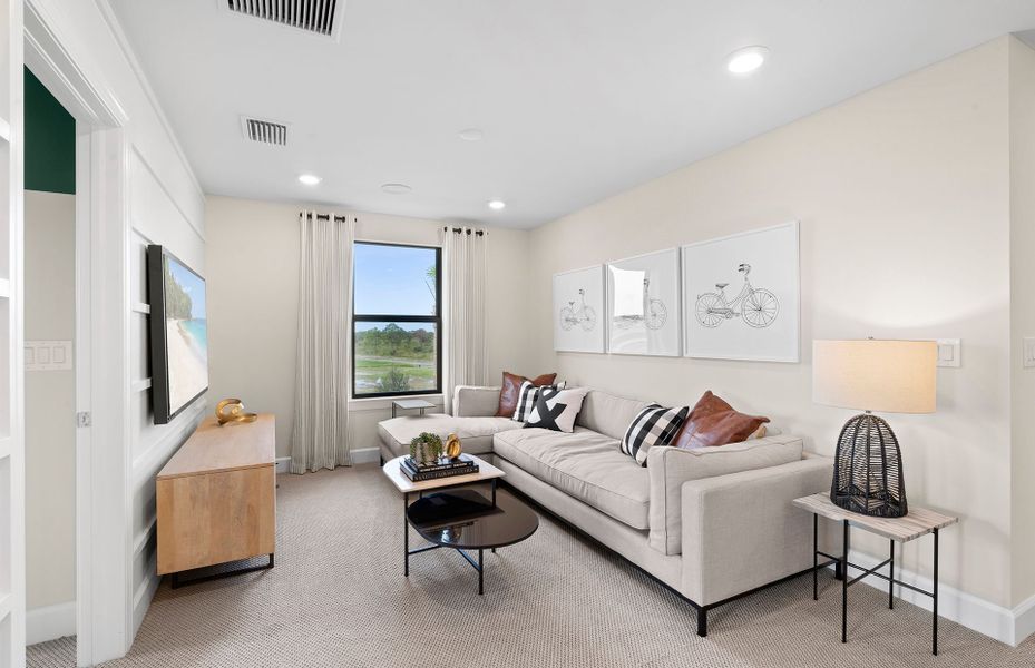 Representative furnished interior of a home built from the Trailside by DiVosta in Talon Preserve on Palmer Ranch, Nokomis (Image 9).