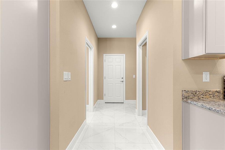 HALLWAY TO MUDROOM FROM KITCHEN