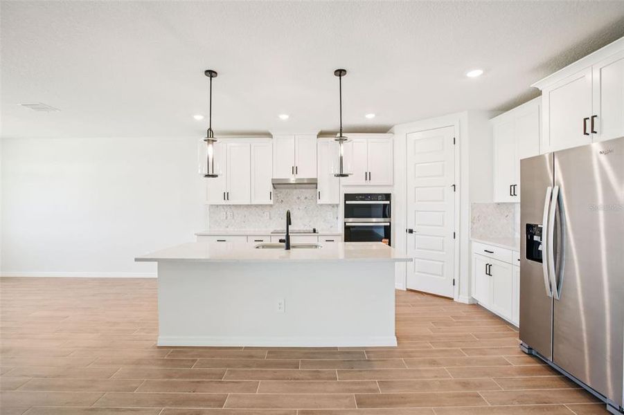 Furnished interior view inside a new home in Two Rivers - Signature Series, Zephyrhills (Image 5).