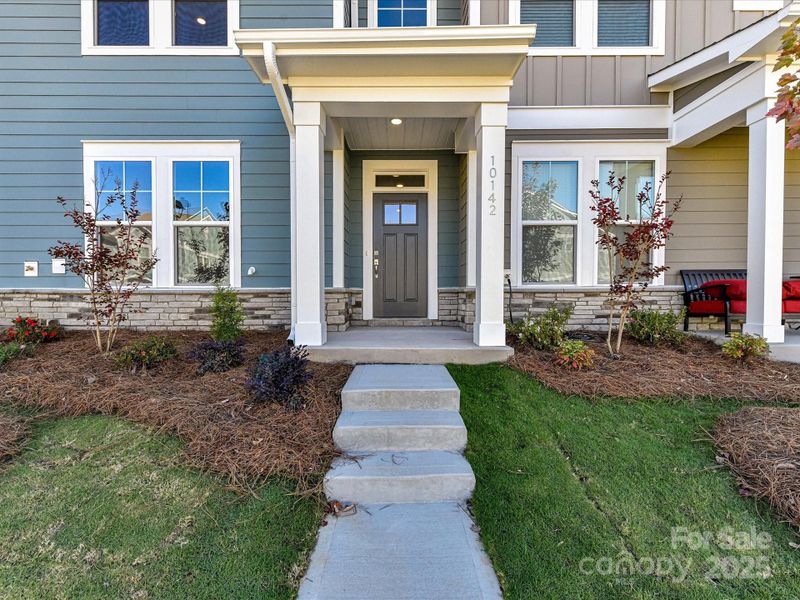 Exterior details and patio area of a home in North Creek Village, Huntersville (Image 20). Exterior details and patio area of a home in North Creek Village, Huntersville (Image 20).