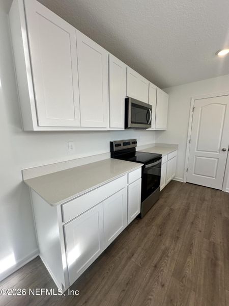 Furnished interior view inside a new home in Rookery, Green Cove Springs (Image 17).