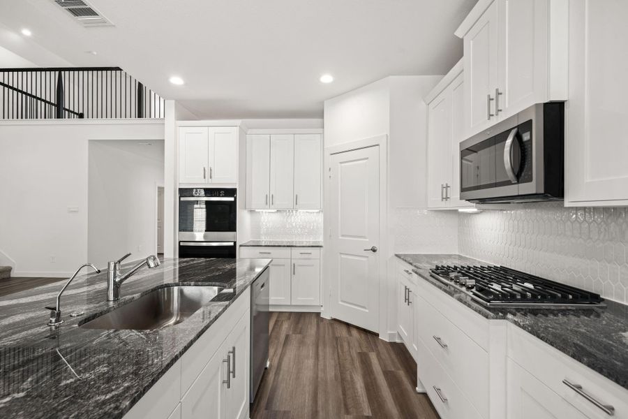 Furnished interior view inside a new home in Harvest Green, Richmond (Image 10). Furnished interior view inside a new home in Harvest Green, Richmond (Image 10).