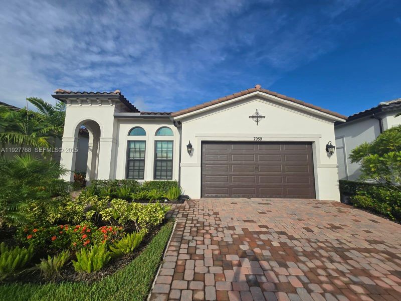 Front exterior of a new home in , Parkland, FL, highlighting curb appeal (Image 29). Front exterior of a new home in , Parkland, FL, highlighting curb appeal (Image 29).