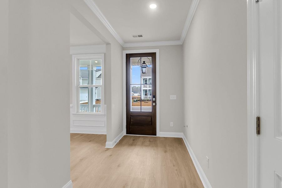 Spacious, unfurnished interior of a new home in Tidewater at Lakes of Cane Bay, Summerville (Image 18).