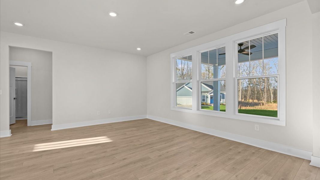 First-rate living space with tasteful hardwood floors and a functional open-concept design