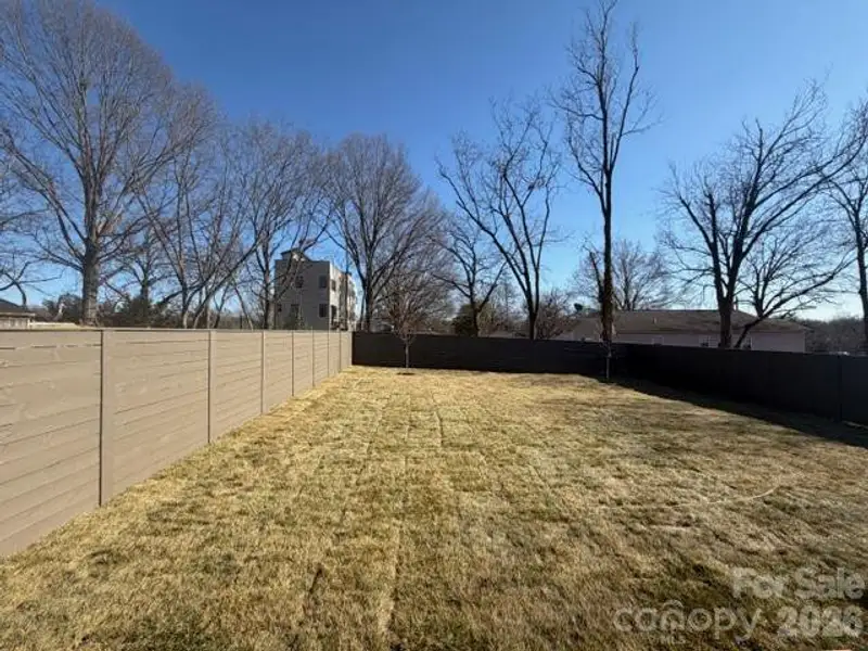 Exterior details and patio area of a home in , Charlotte (Image 2). Exterior details and patio area of a home in , Charlotte (Image 2).