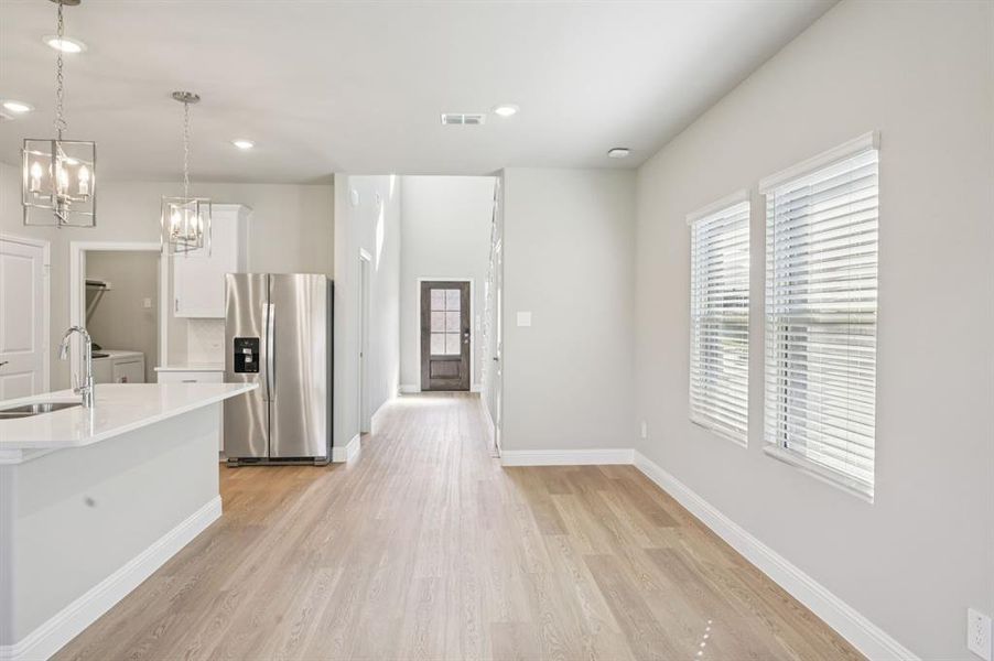 Spacious, unfurnished interior of a new home in Simpson Crossing - Spring Series, McKinney (Image 22).