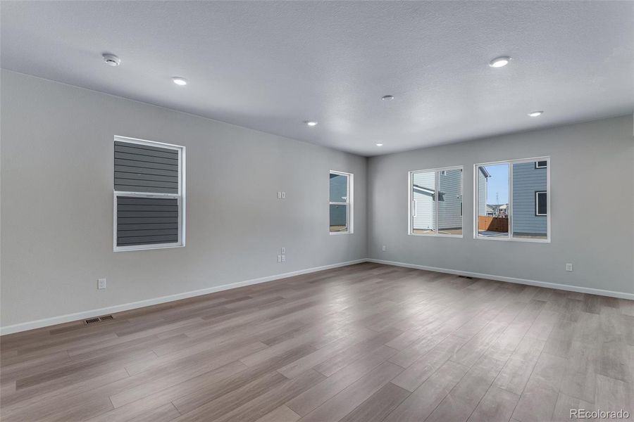 Spacious, unfurnished interior of a new home in Medley at Reunion Ridge, Commerce City (Image 40).