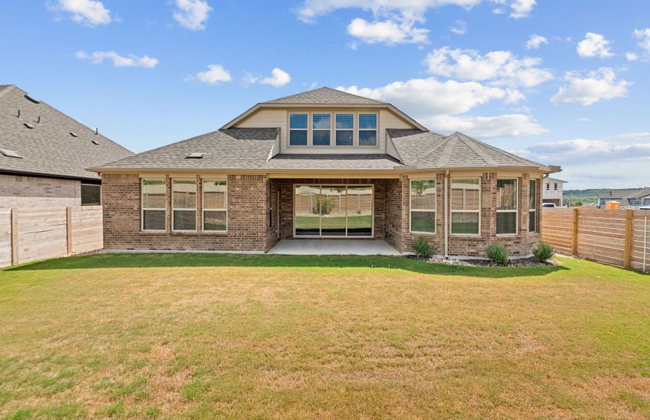 Exterior details and patio area of a home in Bluffview Reserve, Leander (Image 27).