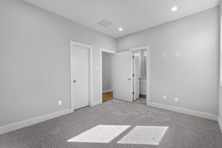 Versatile bedroom with ample space, neutral tones and private bathroom ideal for guests, office, or additional living. Located on 3rd floor.