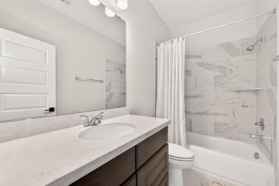 Furnished interior view inside a new home in Cane Island, Katy (Image 10).