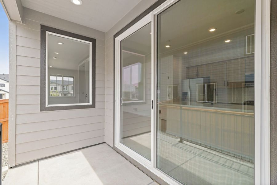 Exterior details and patio area of a home in Sky Ranch, Watkins (Image 4).