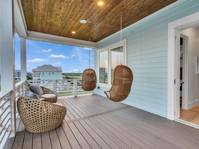 Step out onto either of the two spacious porches and let the coastal breeze sweep over you. Perfect for morning coffee, sunset cocktails, or entertaining friends, these elegant outdoor spaces offer unobstructed, protected Gulf views through lush greenspace. With weather-rated ceiling speakers and room to lounge or dine, every moment here captures the joy, luxury, and relaxed rhythm of beachside living. Step out onto either of the two spacious porches and let the coastal breeze sweep over you. Perfect for morning coffee, sunset cocktails, or entertaining friends, these elegant outdoor spaces offer unobstructed, protected Gulf views through lush greenspace. With weather-rated ceiling speakers and room to lounge or dine, every moment here captures the joy, luxury, and relaxed rhythm of beachside living.