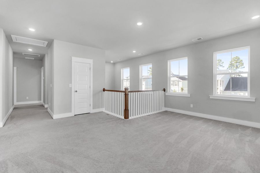 Spacious, unfurnished interior of a new home in Carnes Crossroads: Coastal Collection, Summerville (Image 30).