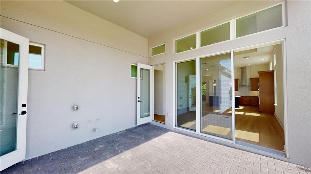 Exterior details and patio area of a home in Persimmon Park, Wesley Chapel (Image 3).