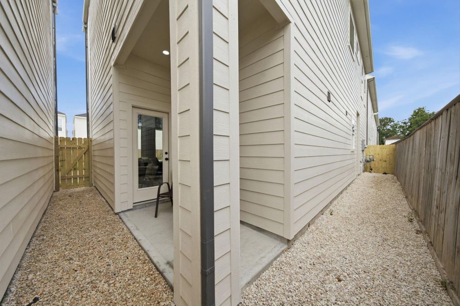 Exterior details and patio area of a home in , Houston (Image 3).