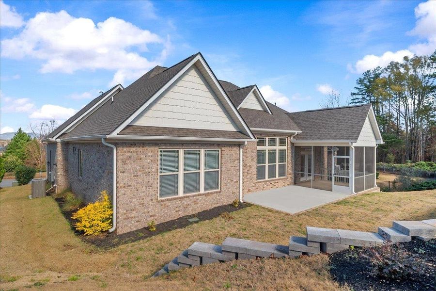 Exterior details and patio area of a home in Lakeside at Blue Ridge Plantation, Taylors (Image 4).