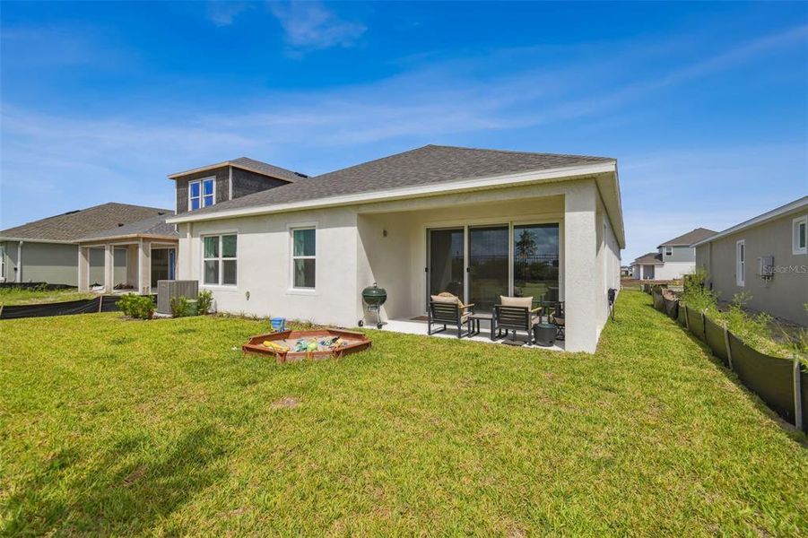 Front exterior of a new home in Waterset, Apollo Beach, FL, highlighting curb appeal (Image 31). Front exterior of a new home in Waterset, Apollo Beach, FL, highlighting curb appeal (Image 31).