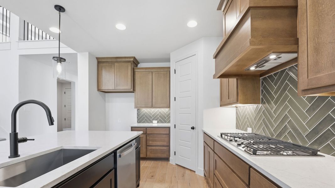 Furnished interior view inside a new home in The Heights at Uptown Celina, Celina (Image 13).