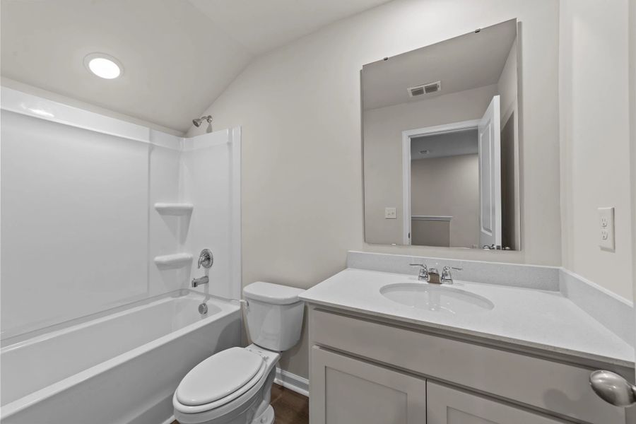 Furnished interior view inside a new home in Blue Heron Retreat, Little River (Image 10).