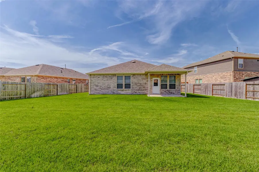 Front exterior of a new home in Marvida, Cypress, TX, highlighting curb appeal (Image 2).