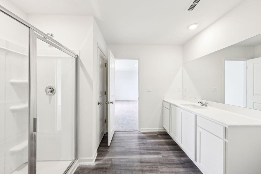 Furnished interior view inside a new home in Sunterra Lakes, Brookshire (Image 9).