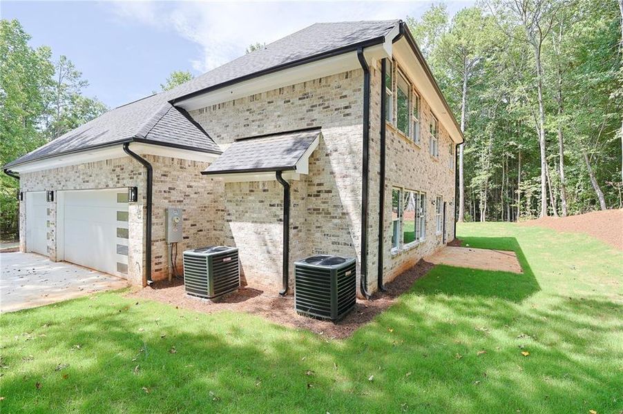 Exterior details and patio area of a home in , McDonough (Image 26).