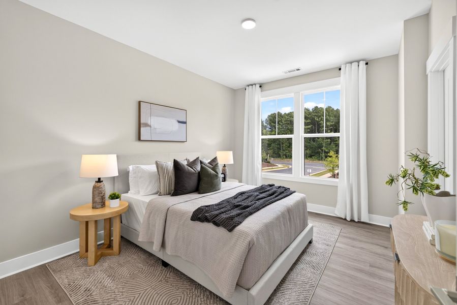 Representative furnished interior of a home built from the Weston End Unit by Baker Residential in Parc at Bradley Farm, Apex (Image 31).