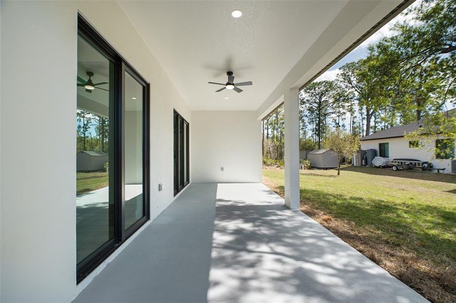 Exterior details and patio area of a home in , North Port (Image 24).